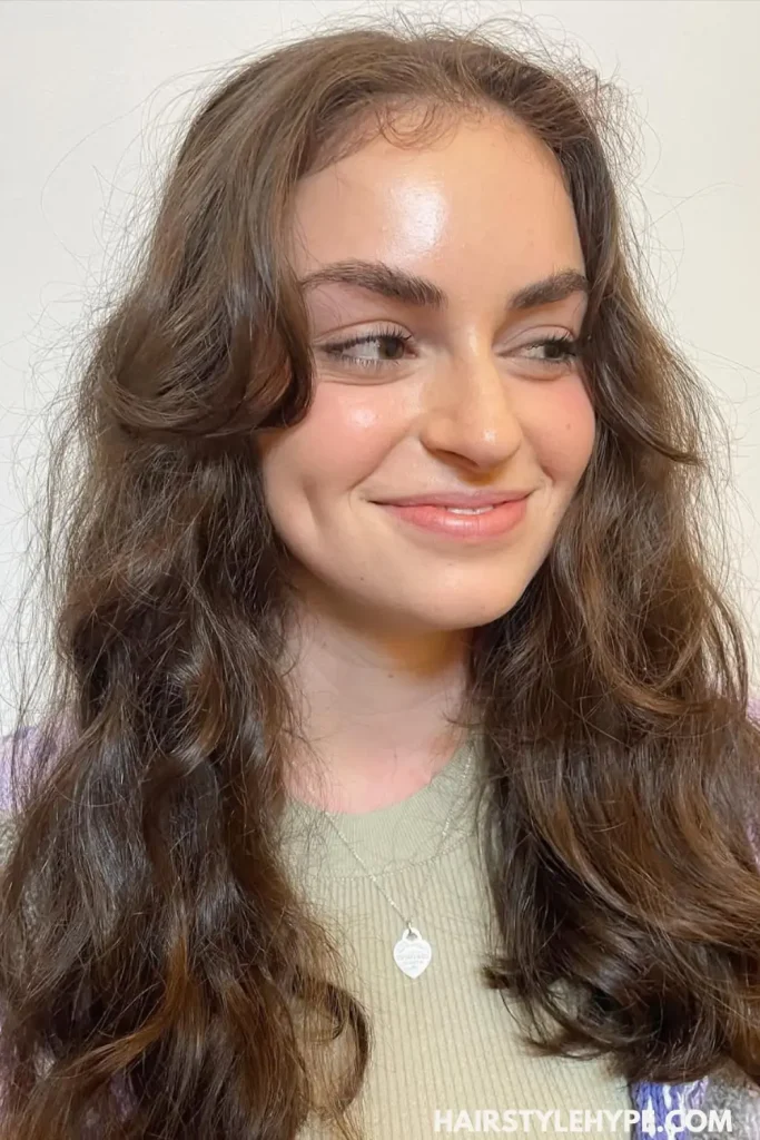 Chin-Length Curly Bob with Curtain Bangs