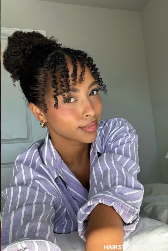 Curly Bun with Bangs