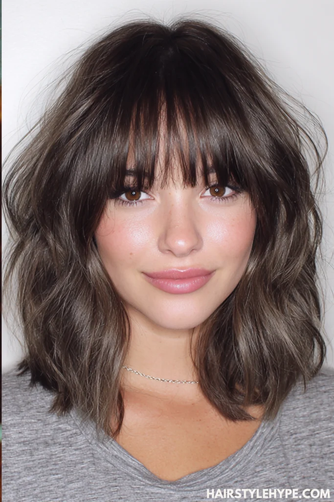 Medium-Length Kitty Cut on Ash Brown Hair