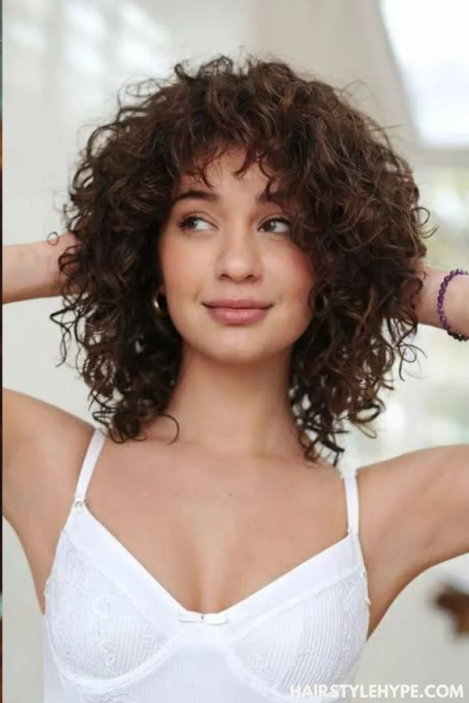 Cute Curly Pixie with Side Bangs