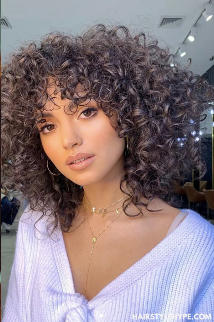 Voluminous Kitty Cut Curly Hair